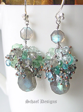 Luscious Blue Flash Labradorite Briolettes crowned with Dainty Songea Sapphires, Delicate London Blue Topaz Briolettes, Shaded Apatite, and Aquamarines Gracefully Dangle from Sterling Silver French Wire Earrings | Sterling Silver | Luxe Gemstone Dangle Earrings