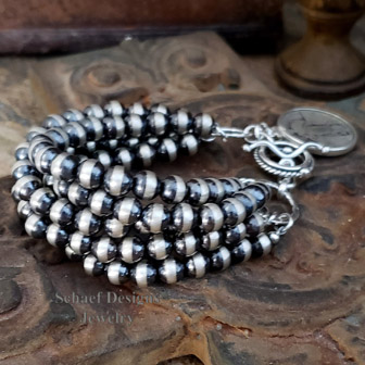 Schaef Designs sterling silver 5 strand navajo pearl bracelet with standing liberty quarter charm | Arizona 