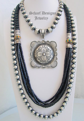  Schaef Designs Jewelry black onyx multi strand necklace, long 12mm bench bead necklace & Vincent Platero Navajo Artist LARGE Zia Concho Pendant | Native American Turquoise Equine Jewelry online gallery | Schaef Designs Collectible artisan handcrafted Southwestern & Equine Jewelry |New Mexico 