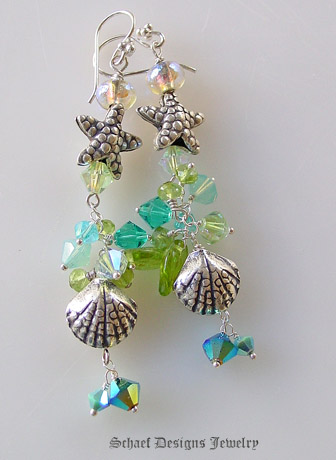 Thai silver seashells and starfish, swarovski cyrstals, peridot & irridescent green leaf & sterling silver dangle beaches earrings | online upscale artisan handcrafted gemstone jewelry boutique | Schaef Designs Gemstone Jewelry | San Diego, CA