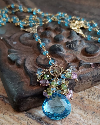 Large 25 Ct Blue Topaz briolette, peridot, yeloow and blue topaz, & pink CZ Monet rosary style necklace with 24kt gold vermeil & blue topaz linked chain | Gem encrusted blue topaz pendant | Upscale Artisan handcrafted Gemstone & Pearl Jewelry | Schaef Designs San Diego CA 