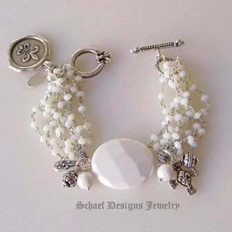 White opal & silver chain bracelet with white agate focal bead & fleur de lis charms | online jewelry boutique | Schaef Designs Signature artisan handcrafted Gemstone & pearl Jewelry | San Diego CA 