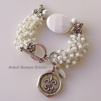 White opal & silver chain bracelet with white agate focal bead & fleur de lis charms | online jewelry boutique | Schaef Designs Signature artisan handcrafted Gemstone & pearl Jewelry | San Diego CA 