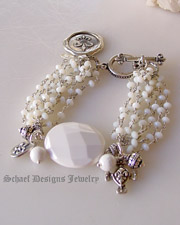  White opal & silver chain bracelet with white agate focal bead & fleur de lis charms | online jewelry boutique | Schaef Designs Signature artisan handcrafted Gemstone & pearl Jewelry | San Diego CA 