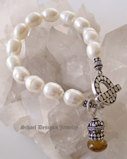 Creamy White freshwater pearl bracelet with sterling silver toggle & onion briolette charm | online upscale artisan handcrafted jewelry boutique | Schaef Designs Pearl Jewelry | San Diego, CA 