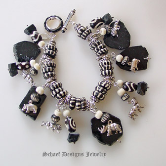  Schaef Designs sterling silver endangered species african animal, trade beads & black tourmaline charm bracelet | Upscale online jewelry boutique gallery | Schaef Designs Totem Animal Shaman Jewelry | San Diego, CA