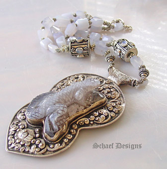 Carved Tibetan chalcedony lizard & sterling silver pendant on chalcedony Necklace by Schaef Designs | New Mexico 