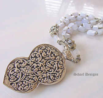 Carved Tibetan chalcedony lizard & sterling silver pendant on chalcedony Necklace by Schaef Designs | New Mexico