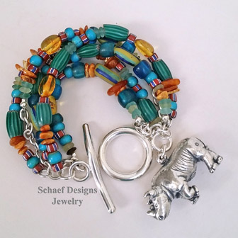 Susan Cummings Vintage Rhino Charm on African Trade Bead Charm Bracelet | New Mexico 