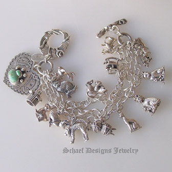 Schaef Designs Turquoise Cat Paw Print Heart Cat Fancy sterling silver charm bracelet |  pet lovers jewelry | upscale collectible Southwestern, Native American, Equine, & turquoise jewelry gallery | Schaef Designs artisan handcrafted, southwestern & turquoise Jewelry |New Mexico 