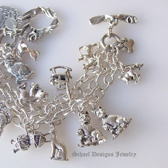 Schaef Designs Turquoise Cat Paw Print Heart Cat Fancy sterling silver charm bracelet |  pet lovers jewelry | upscale collectible Southwestern, Native American, Equine, & turquoise jewelry gallery | Schaef Designs artisan handcrafted, southwestern & turquoise Jewelry | New Mexico 