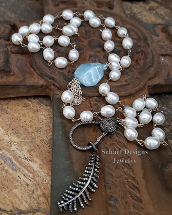 Schaef Designs pave diamond feather pendant on white freshwater pearl & aquamarine necklace | Arizona 