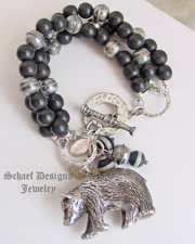 Susan Cummings Sterling Silver Vintage large bear charm and black wooden bead
Charm Bracelet | Schaef Designs | New Mexico